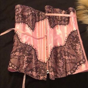Pink and black corset